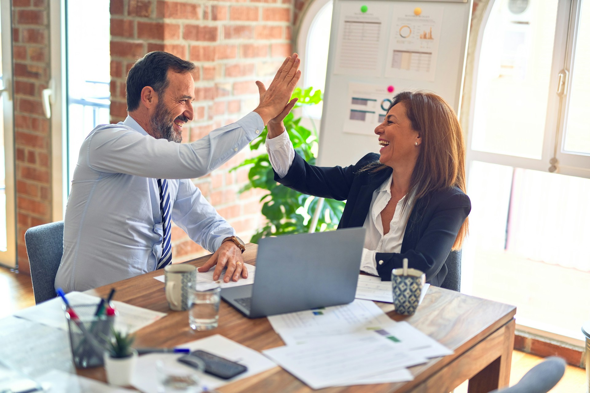 RealEstate Agent celebrating sales win